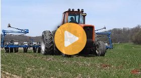 Planting corn with an Allis-Chalmers tractor