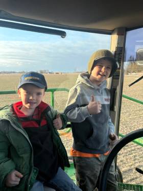 No kidding! Over at Pearson Farms in Minesing, these two may have a hard time getting to the bus at 9 AM, but no problem when the spinner is heading out for the first time this year at 6 AM!