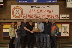 The Richmond family was on hand to present the trophy to the winners of the bonspiel--Team Jerry Meyskens. The trophy was dedicated to Bob Richmond after his passing in 1993 to recognize all his efforts and contributions to the bonspiel.