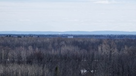 Warren Schneckenburger’s view of the Adirondack from on top a bin in Eastern Ontario where the sun feels warm.