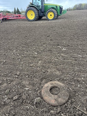 What lies beneath… Working this farm for 30 years, ripped it deep at least twice, and yet this 100+ lbs. wheel weight from popped up today.